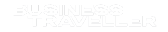 Text logo with the words "Business Traveller" in a modern, outlined font on a white background, inspired by the vibrant spirit of Nashville, Music City.